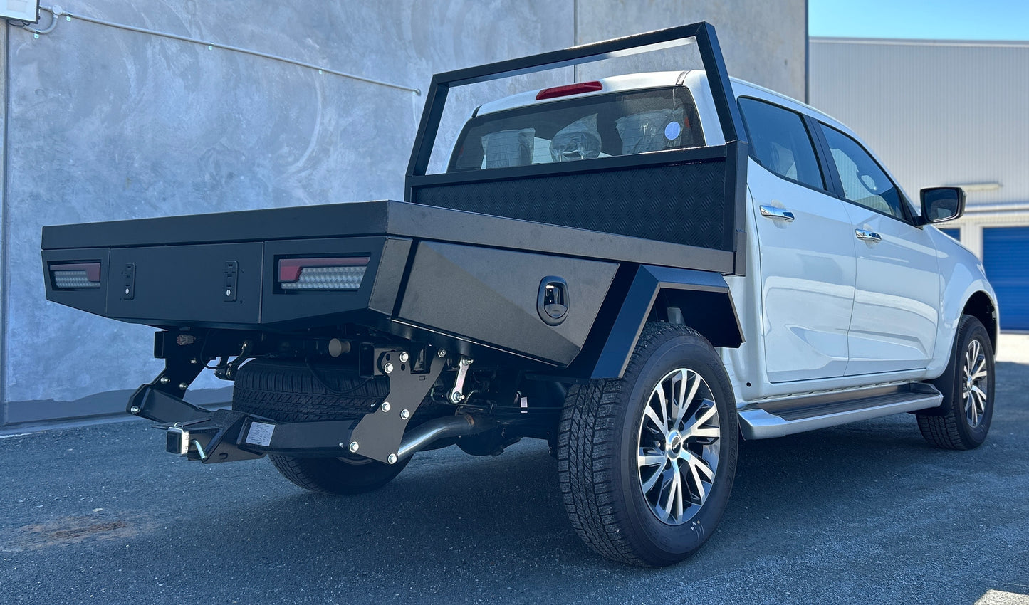side view of black ute tray with headboard